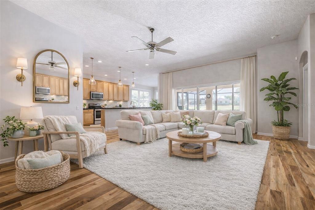 1751 Lakestone Drive Trinity, FL 34655 - Photo 6 of 51 a living room with furniture and a large window