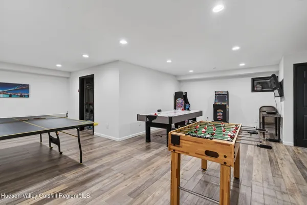 a workspace with furniture and wooden floor