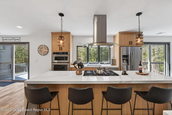 a kitchen with a table and chairs in it