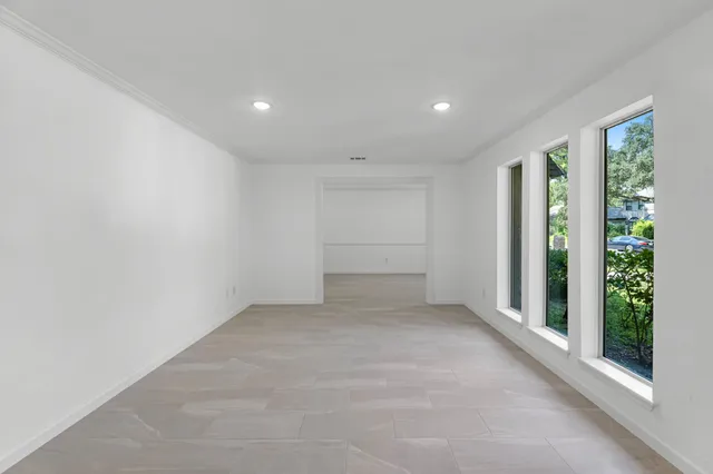 an empty room with windows