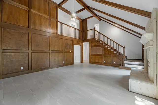 a view of a house with a street