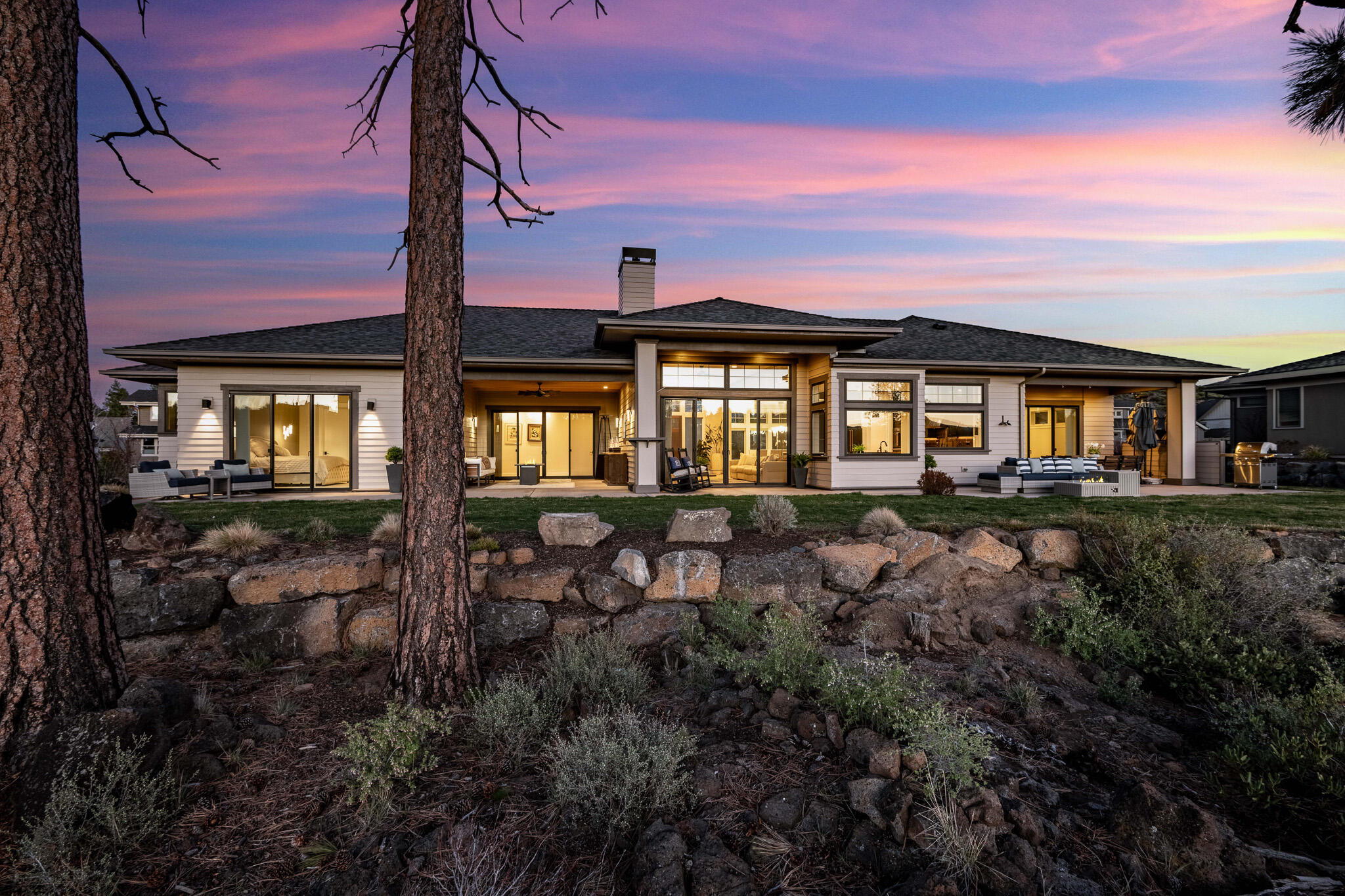 60871 River Rim Drive Bend, OR 97702 - Photo 5 of 42 a view of a house with a patio