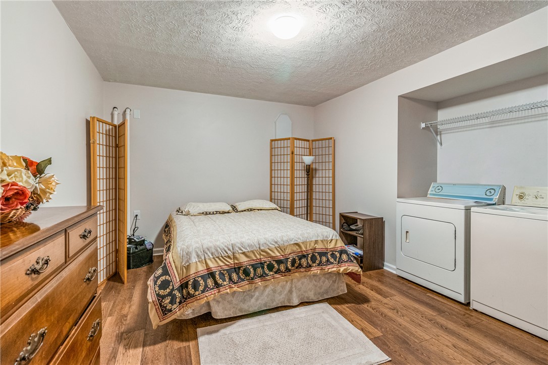 610 West Alex Bell Road Dayton, OH 45459 - Photo 32 of 36 This versatile room features durable flooring and convenient laundry amenities.