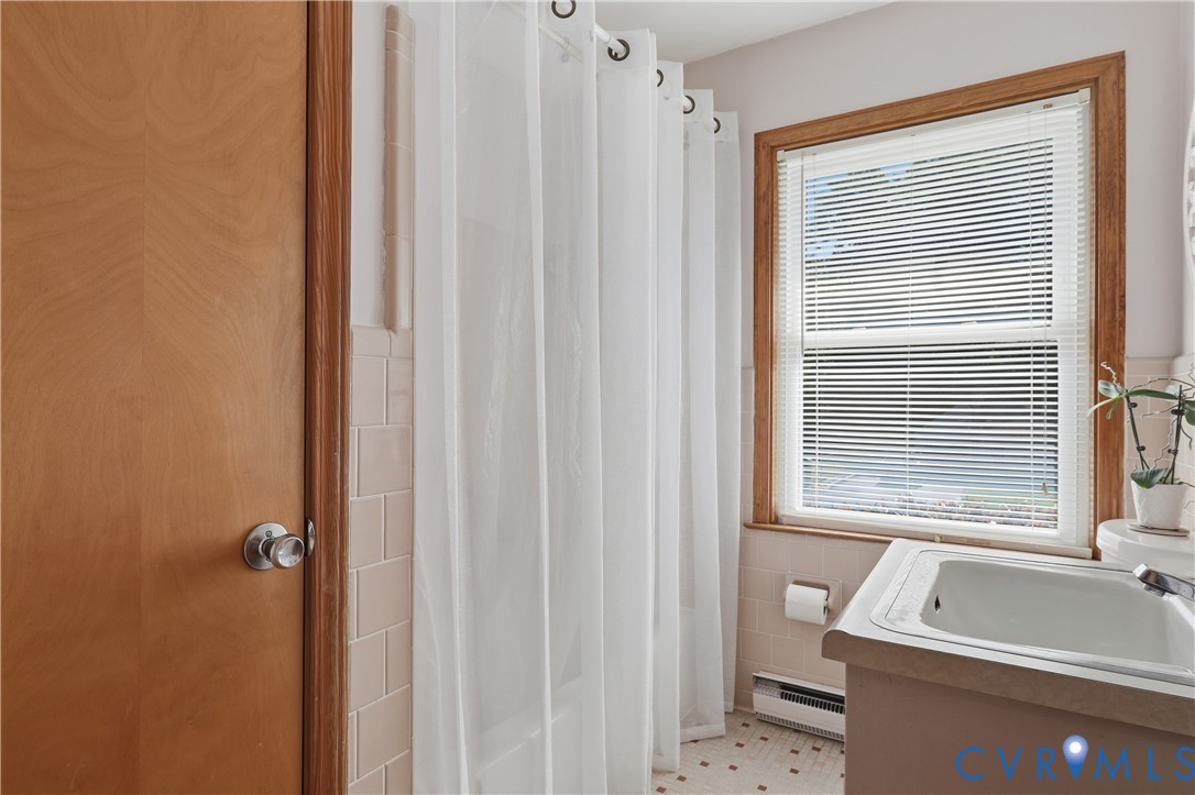 5210 Ronson Road North Chesterfield, VA 23234 - Photo 27 of 35 Bathroom featuring a wood-trimmed window with blin