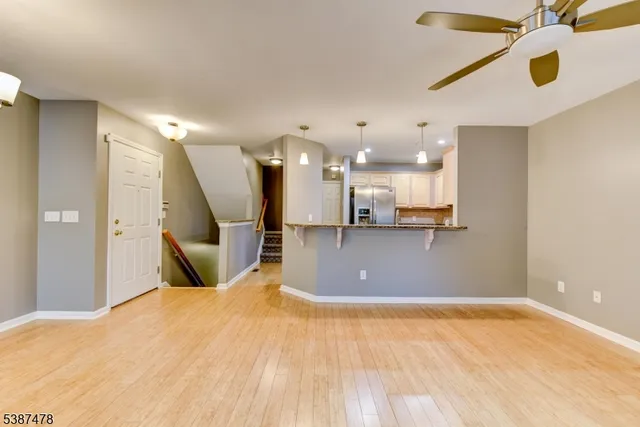 a view of a kitchen with a dishwasher and cabinets