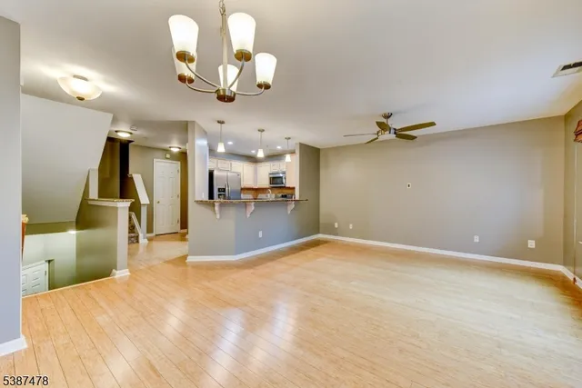 a view of a kitchen and a chandelier