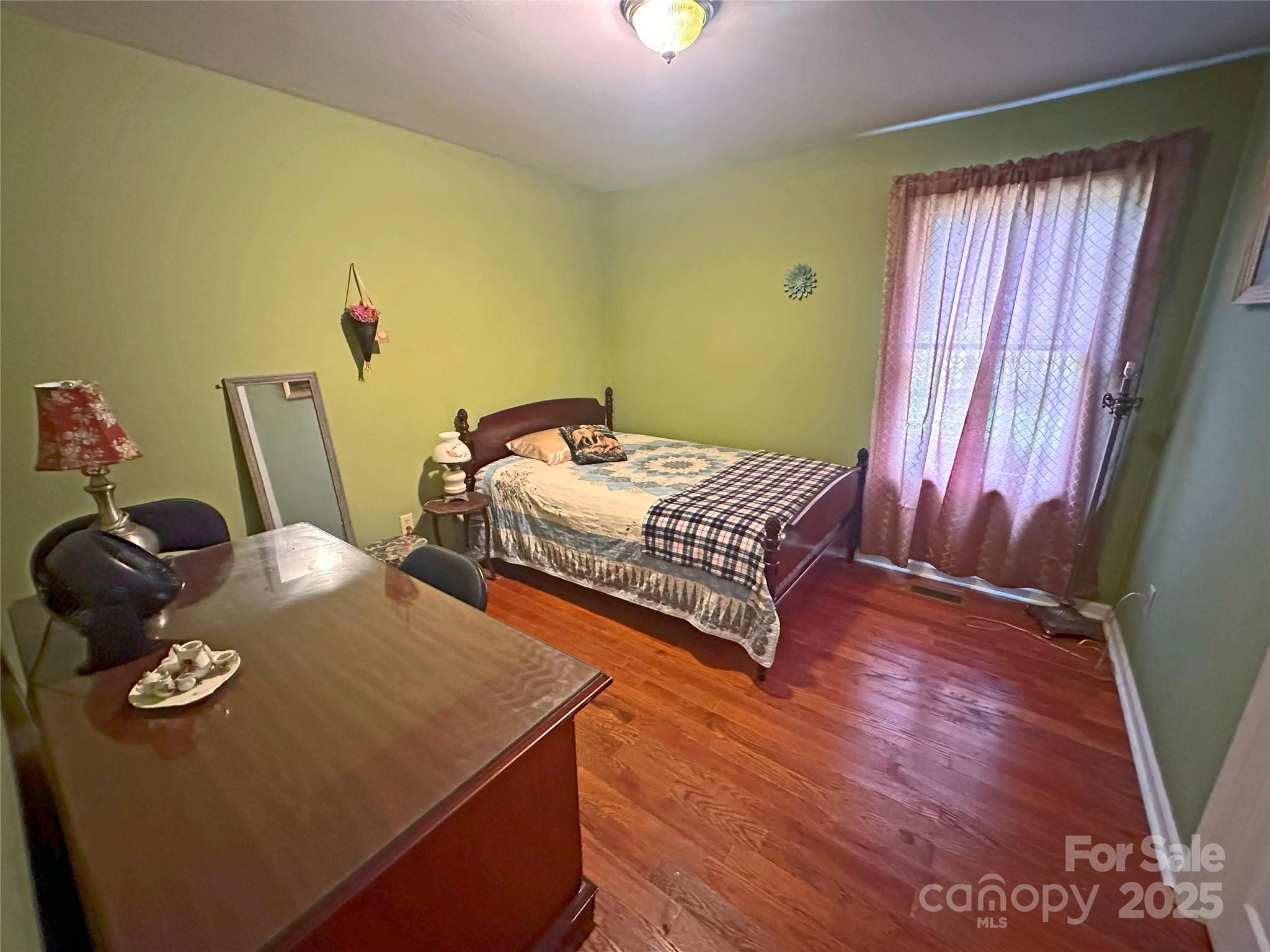 3603 Ritchie Road Lincolnton, NC 28092 - Photo 12 of 44 a bedroom with two beds and a desk