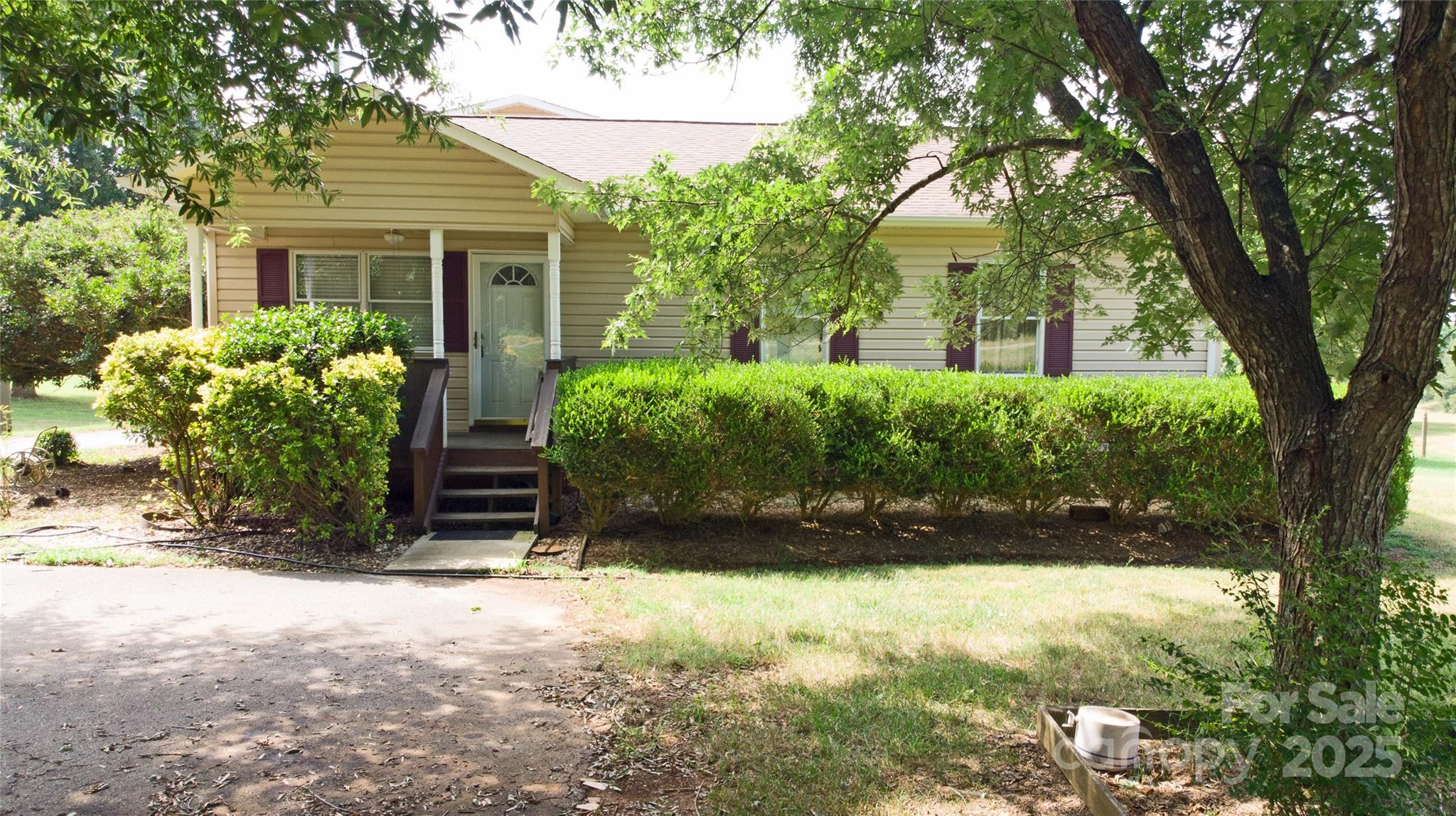 3603 Ritchie Road Lincolnton, NC 28092 - Photo 26 of 44 front view of a house with a yard