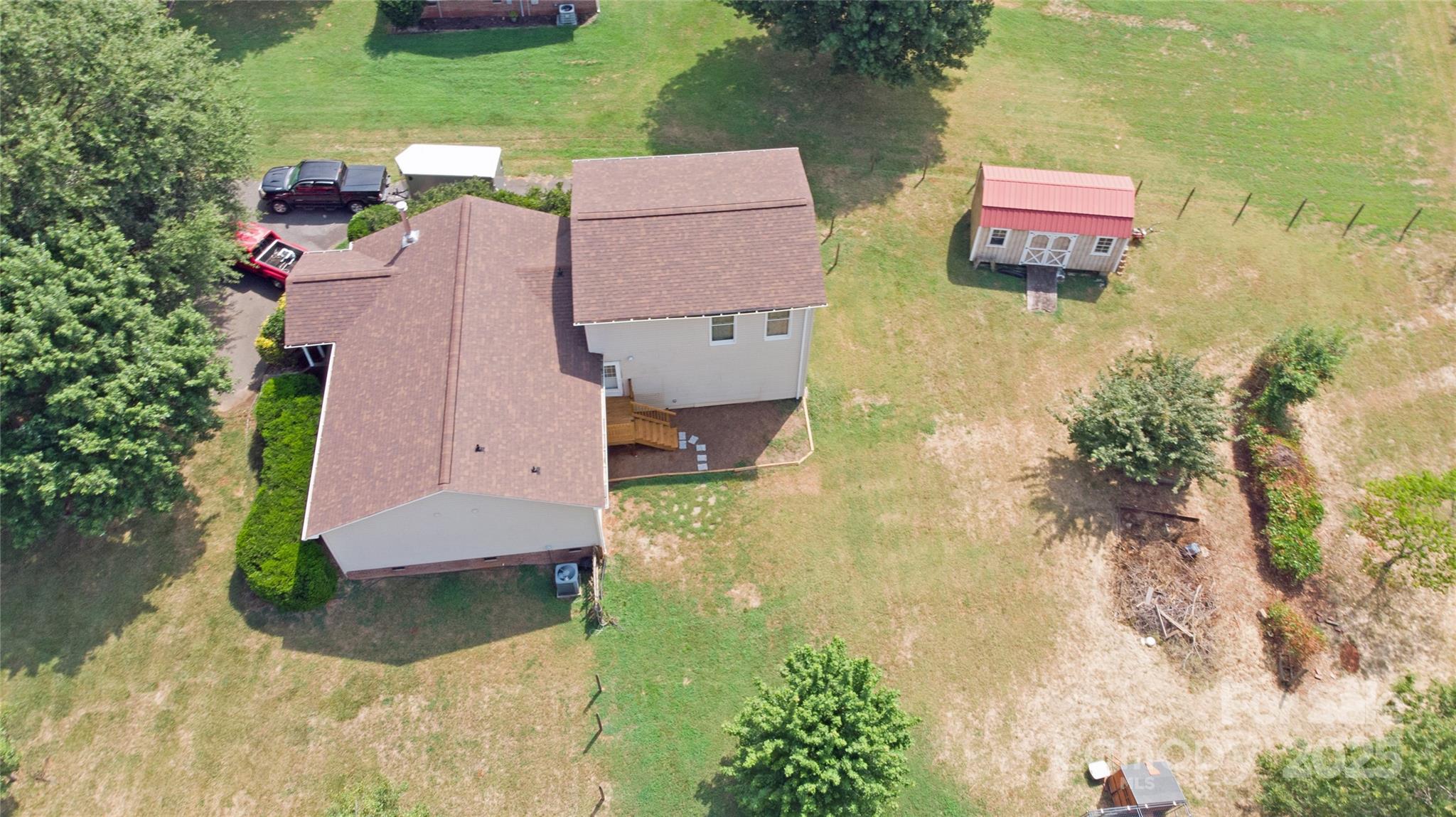 3603 Ritchie Road Lincolnton, NC 28092 - Photo 29 of 44 an aerial view of residential house with outdoor space and swimming pool