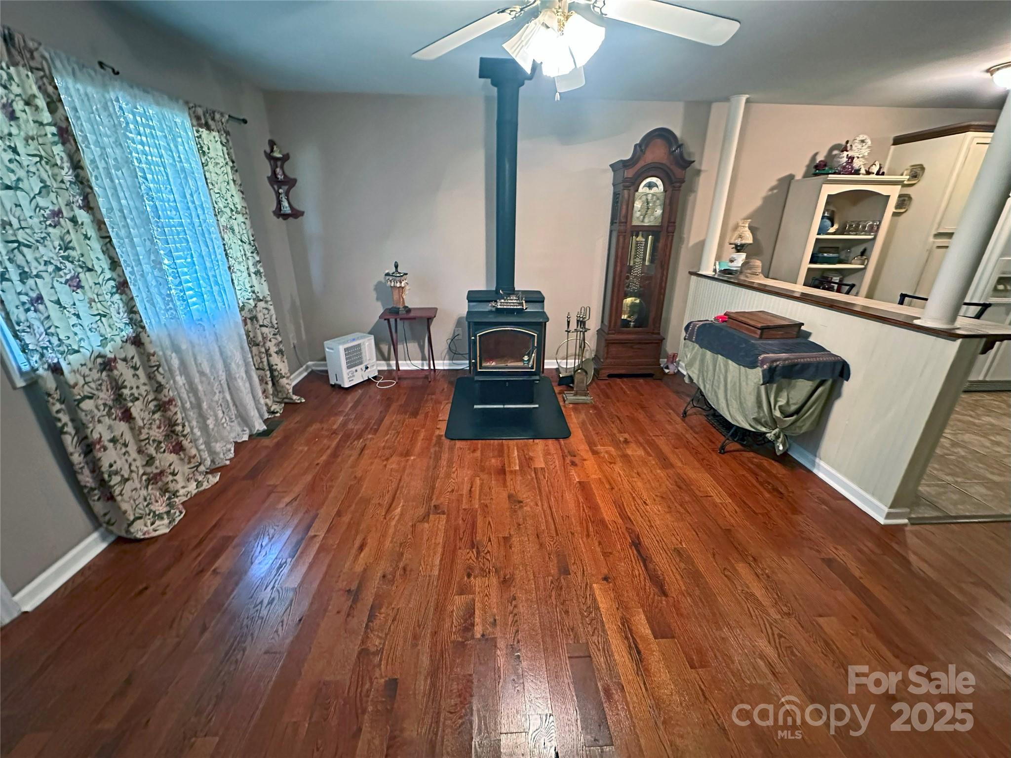 3603 Ritchie Road Lincolnton, NC 28092 - Photo 33 of 44 a living room with furniture and a wooden floor