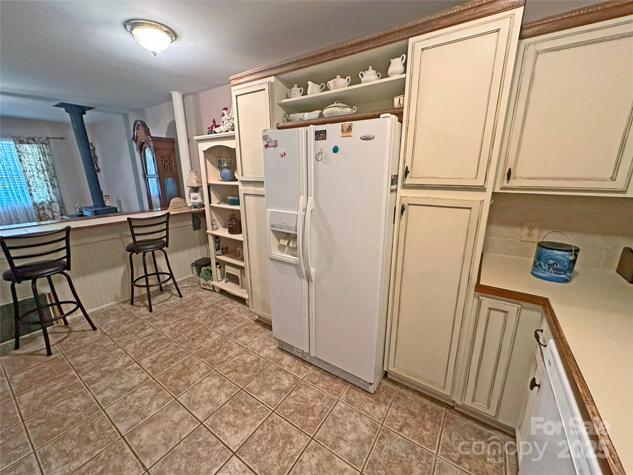 3603 Ritchie Road Lincolnton, NC 28092 - Photo 36 of 44 a view of kitchen with furniture and refrigerator