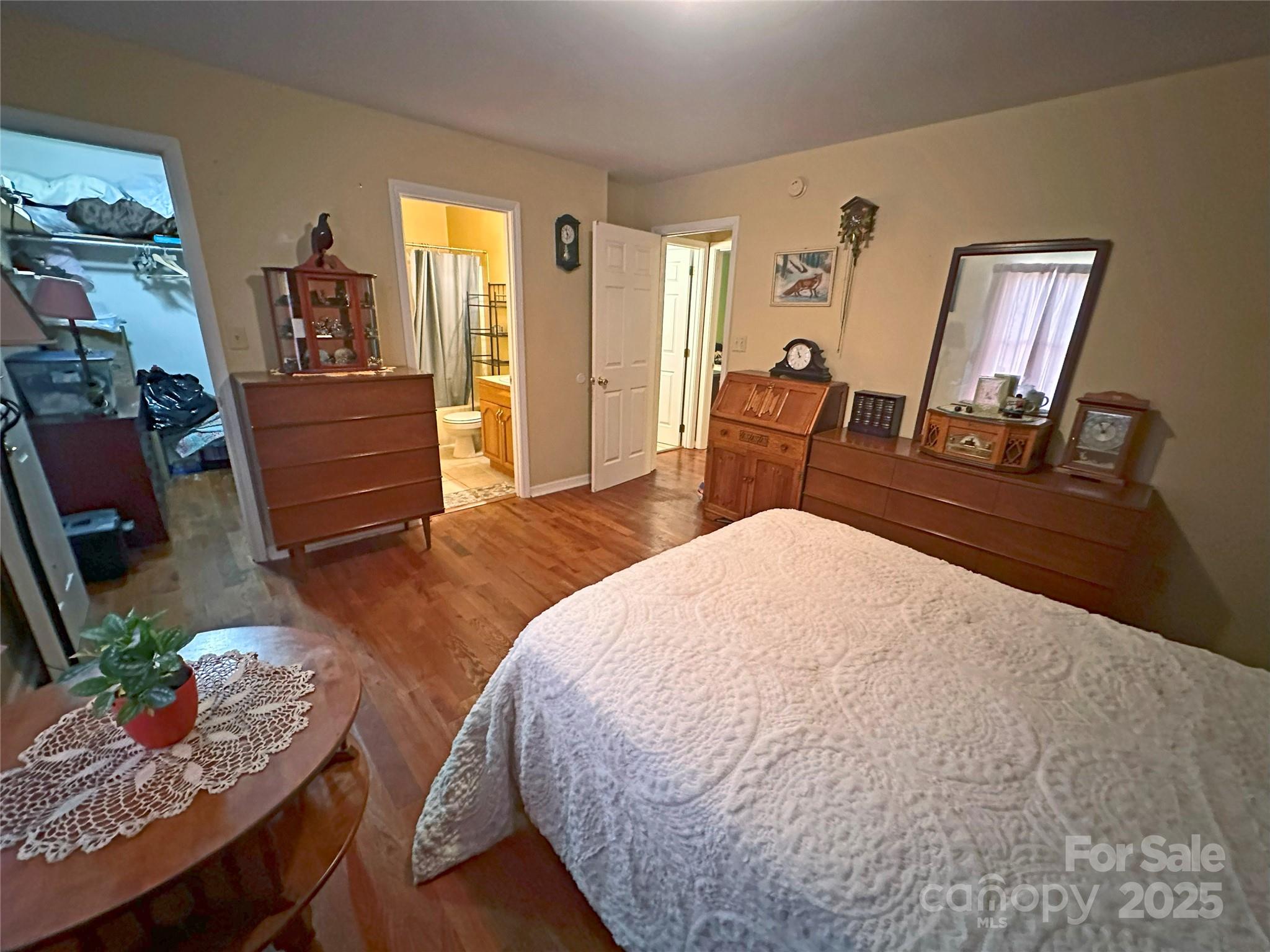 3603 Ritchie Road Lincolnton, NC 28092 - Photo 39 of 44 a bed room with a bed and wooden floor