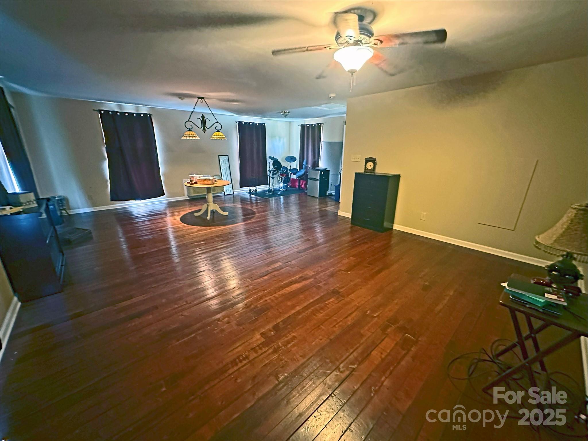 3603 Ritchie Road Lincolnton, NC 28092 - Photo 43 of 44 a view of a dining room with furniture and wooden floor