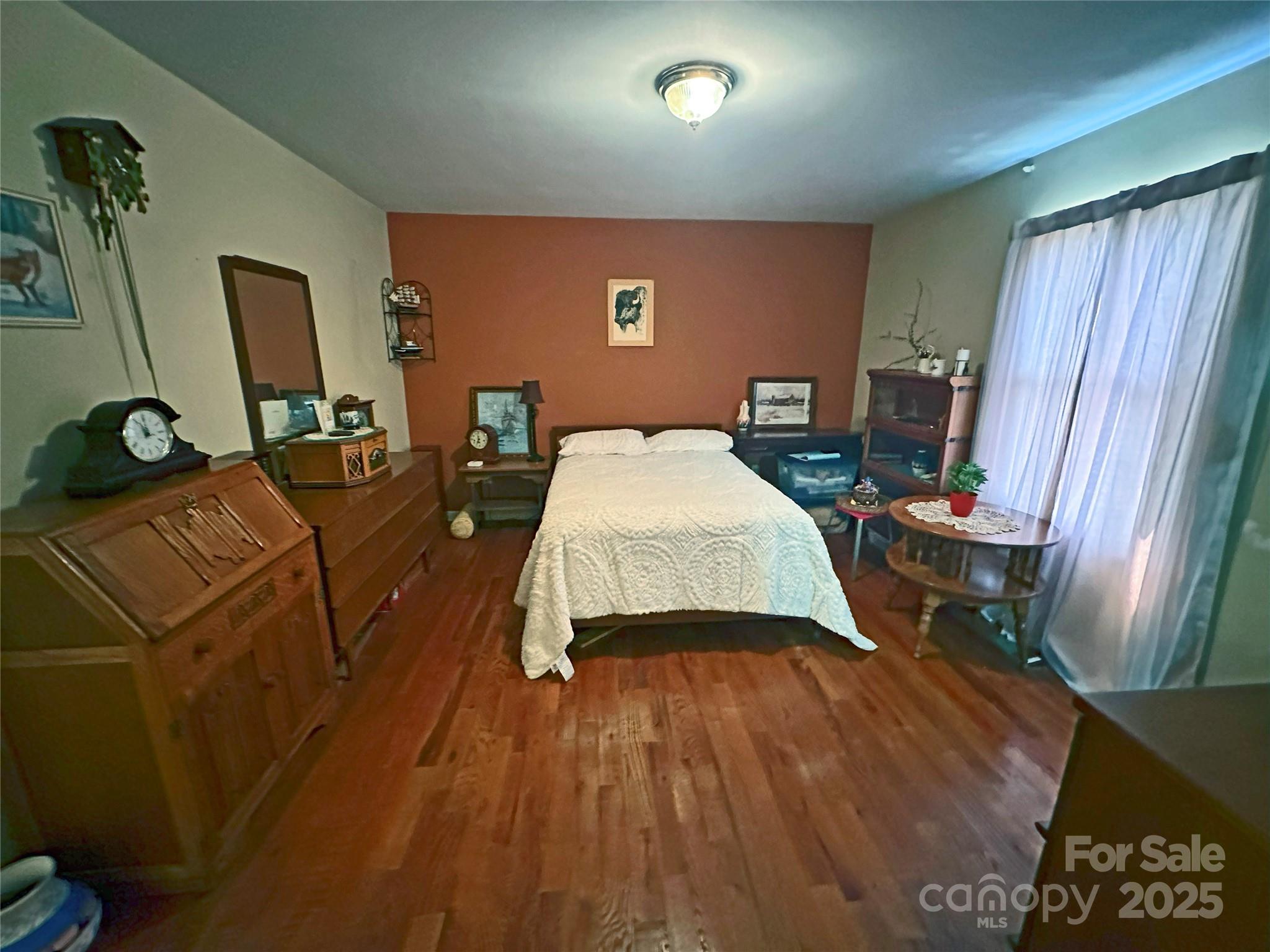 3603 Ritchie Road Lincolnton, NC 28092 - Photo 9 of 44 a living room with furniture and a flat screen tv