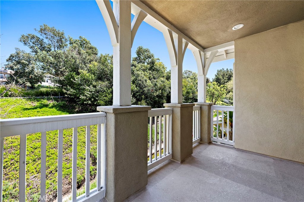 41 Passaflora Lane Ladera Ranch, CA 92694 - Photo 12 of 36 a view of a balcony with wooden fence