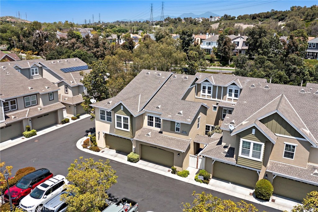 41 Passaflora Lane Ladera Ranch, CA 92694 - Photo 20 of 36 an aerial view of multiple houses with a street