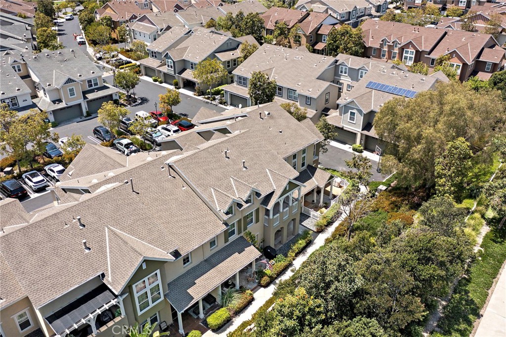 41 Passaflora Lane Ladera Ranch, CA 92694 - Photo 21 of 36 an aerial view of a house with a yard and lake view