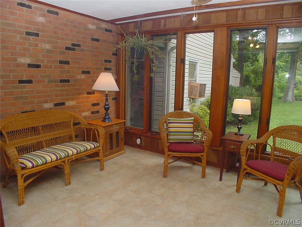 8420 Larkspur Road North Chesterfield, VA 23235 - Photo 17 of 47 Sun porch has a rail to hang plants from