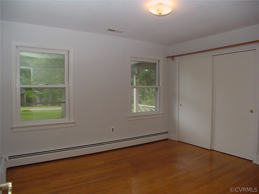 8420 Larkspur Road North Chesterfield, VA 23235 - Photo 25 of 47 Front bedroom has oak floor & large closet w extra