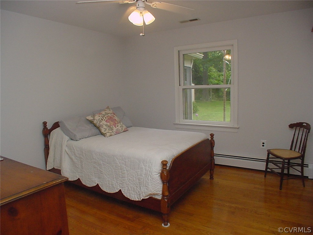 8420 Larkspur Road North Chesterfield, VA 23235 - Photo 26 of 47 Back bedroom has ceiling fan & oak floor