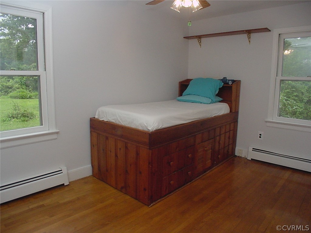 8420 Larkspur Road North Chesterfield, VA 23235 - Photo 30 of 47 4th bedroom has 2 windows, ceiling fan & bed w bui