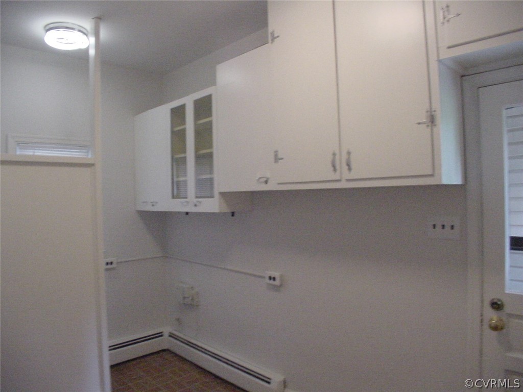8420 Larkspur Road North Chesterfield, VA 23235 - Photo 33 of 47 Lots of cabinet storage space in the Laundry room