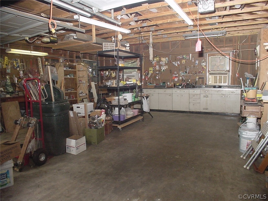 8420 Larkspur Road North Chesterfield, VA 23235 - Photo 39 of 47 Garage has shelving &work bench