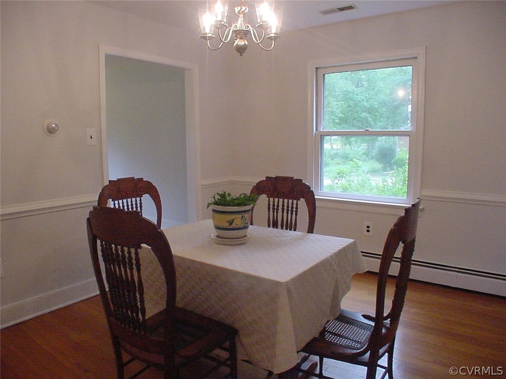 8420 Larkspur Road North Chesterfield, VA 23235 - Photo 5 of 47 Dining room has chair rail and a new chandlier