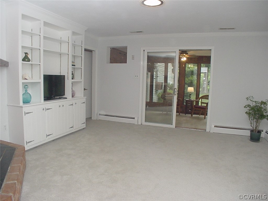8420 Larkspur Road North Chesterfield, VA 23235 - Photo 7 of 47 Family room has new carpet and glass door to the s