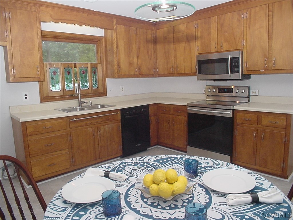 8420 Larkspur Road North Chesterfield, VA 23235 - Photo 10 of 47 Eat-in kitchen has lots of cabinets and new light