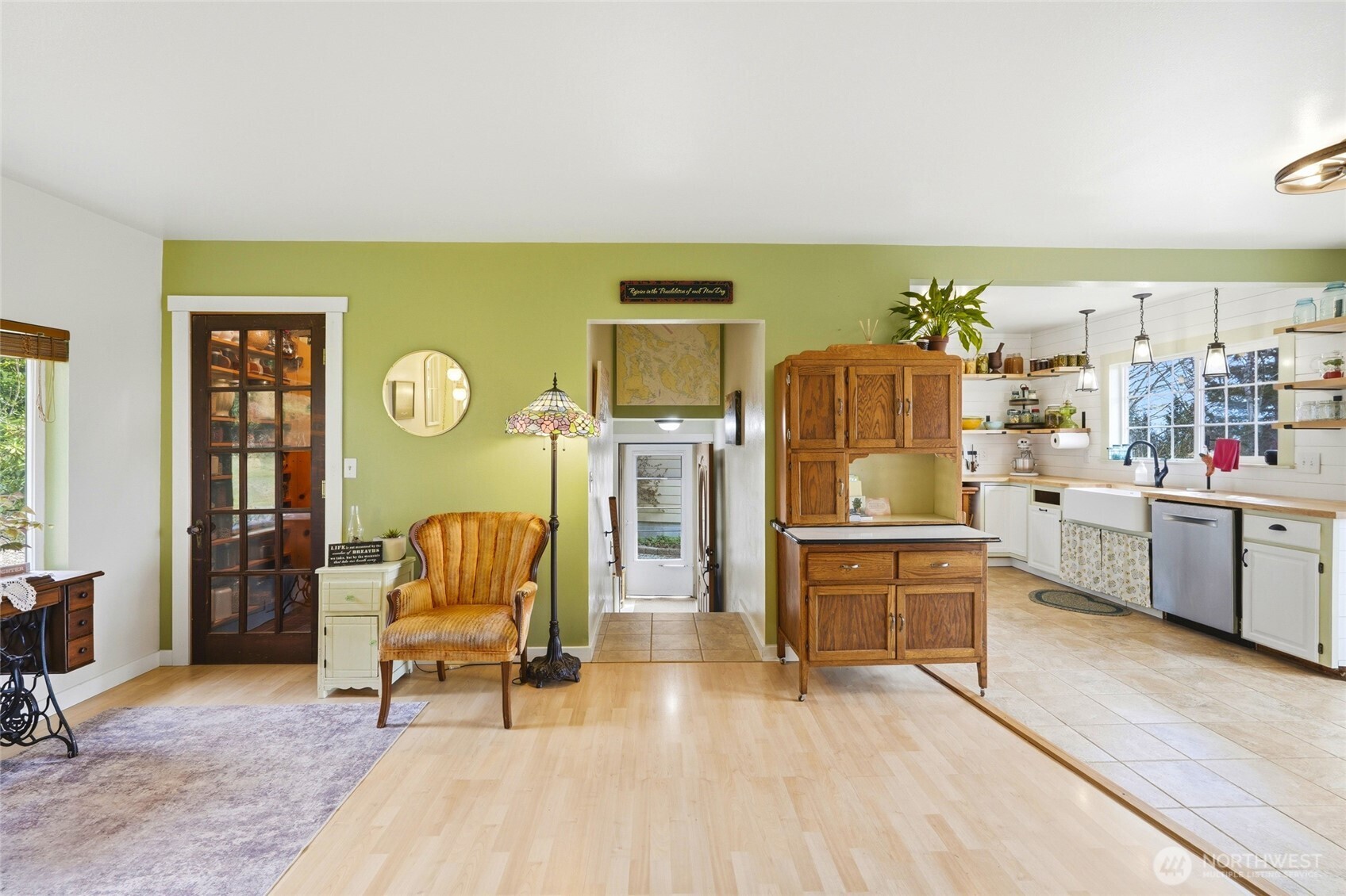 5334 Tenneson Road Sedro-Woolley, WA 98284 - Photo 11 of 39 a living room with stainless steel appliances kitchen island granite countertop furniture and a kitchen view