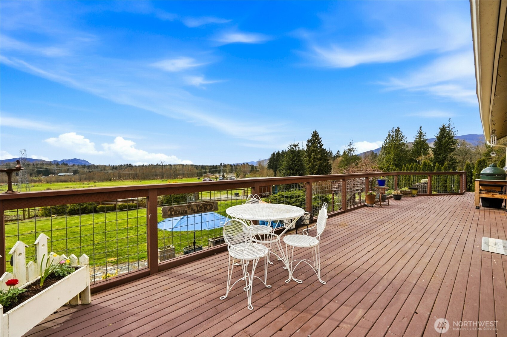 5334 Tenneson Road Sedro-Woolley, WA 98284 - Photo 20 of 39 a view of a balcony with wooden floor and outdoor space
