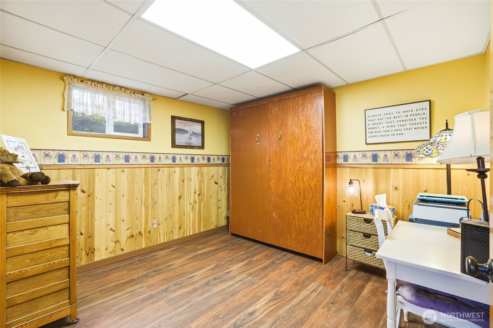5334 Tenneson Road Sedro-Woolley, WA 98284 - Photo 25 of 39 a view of a bedroom with wooden floor and furniture