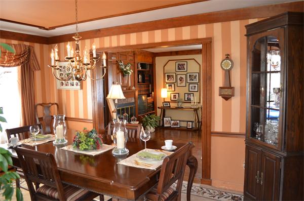 1938 Main Road Tiverton, RI 02878 - Photo 4 of 15 a view of a dining room with furniture window and wooden floor