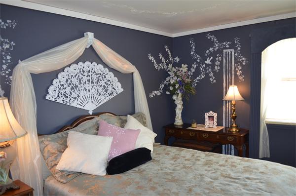 1938 Main Road Tiverton, RI 02878 - Photo 9 of 15 a bedroom with a bed and a table