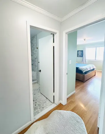 a bathroom with a toilet a sink and a shower