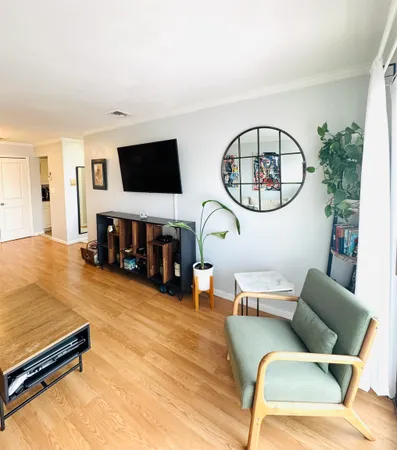 a kitchen with a stove a sink and a refrigerator