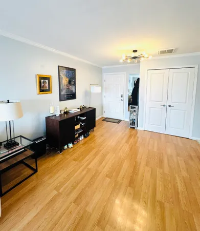 a kitchen with a stove a sink and a refrigerator