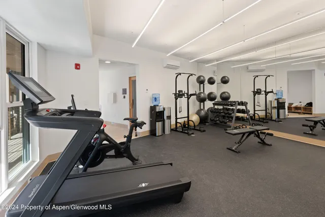 a view of a room with gym equipment