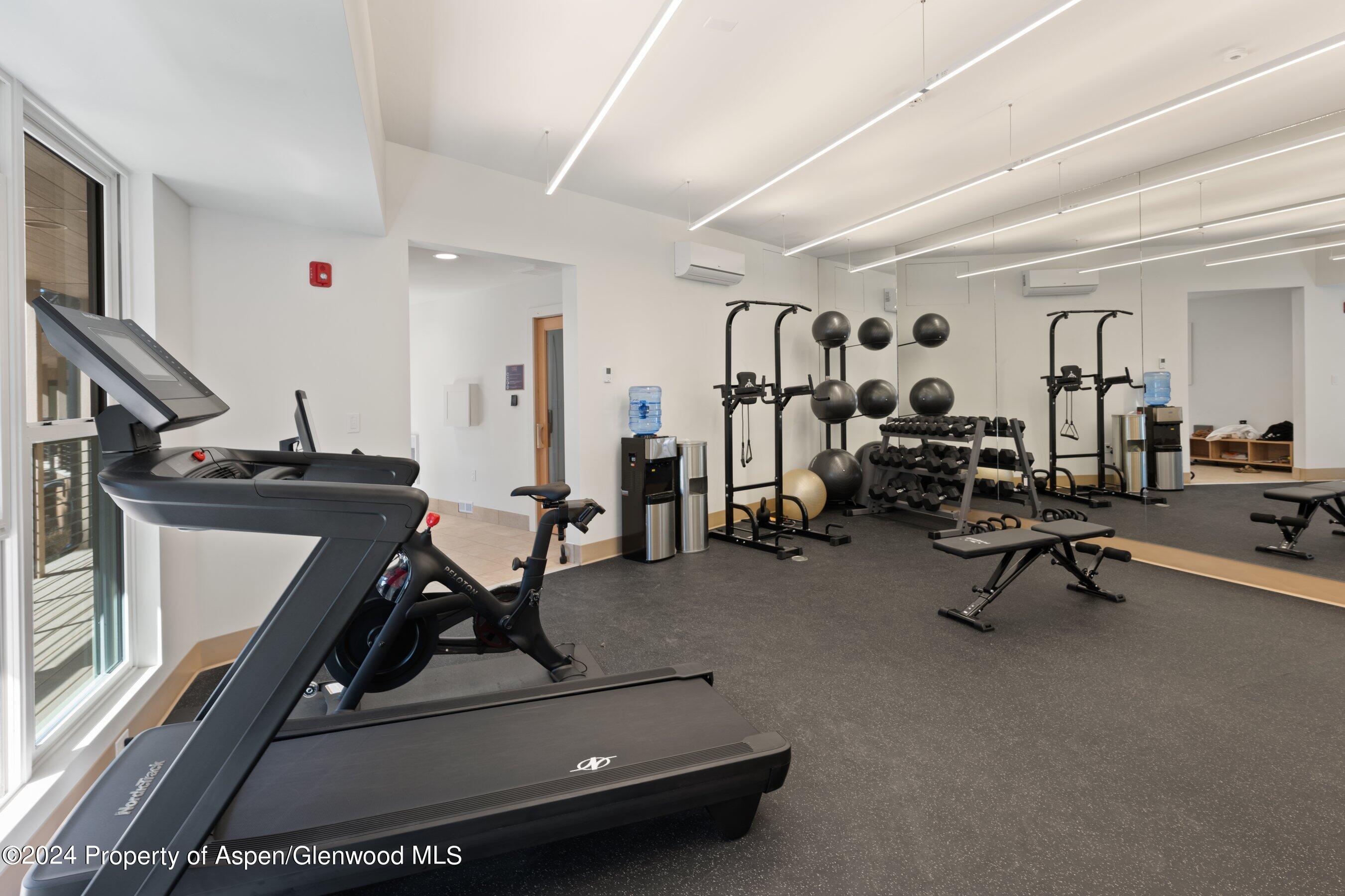 35 Upper Woodbridge Road, Unit 26EF Snowmass Village, CO 81615 - Photo 17 of 17 a view of a room with gym equipment
