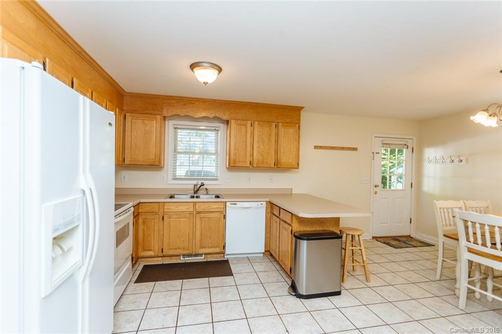 3114 Bush Road, Unit 19 Clover, SC 29710 - Photo 5 of 16 a kitchen with a cabinets and counter space