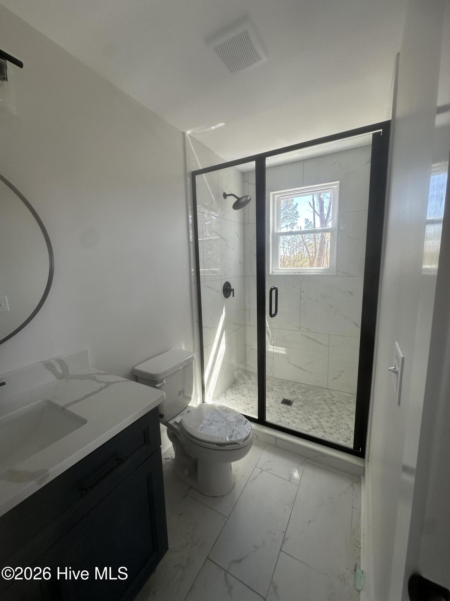 623 Winding Creek Road Rocky Point, NC 28457 - Photo 37 of 38 bonus room bath, with walk in tile shower