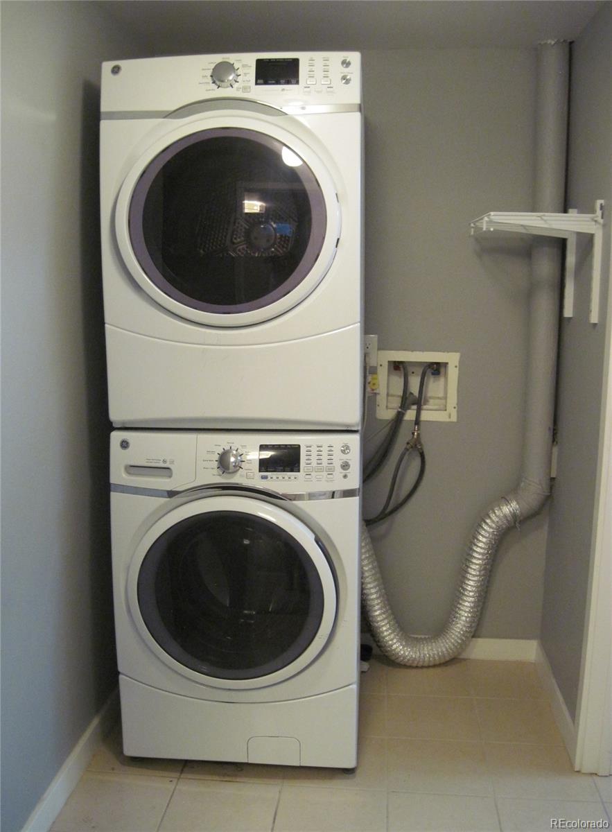 1014 Alexander Road Colorado Springs, CO 80909 - Photo 26 of 44 a utility room with dryer and washer