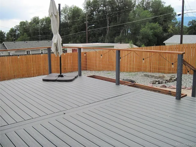 a view of a wooden floor with a bench