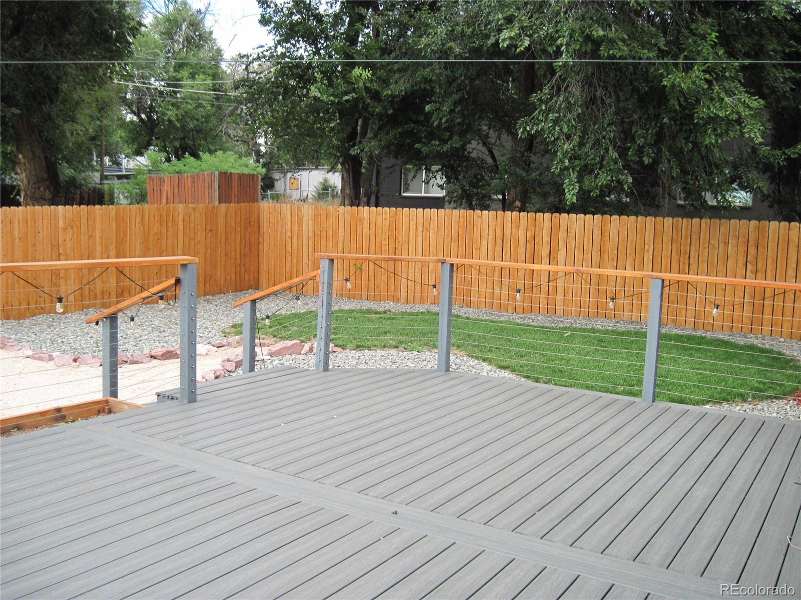 1014 Alexander Road Colorado Springs, CO 80909 - Photo 34 of 44 a view of a backyard