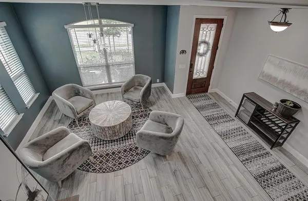 a view of a dining room with furniture window and outside view