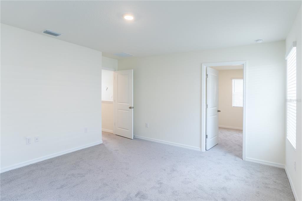 4807 Southwest 51st Terrace Gainesville, FL 32608 - Photo 24 of 35 a view of an empty room and a window