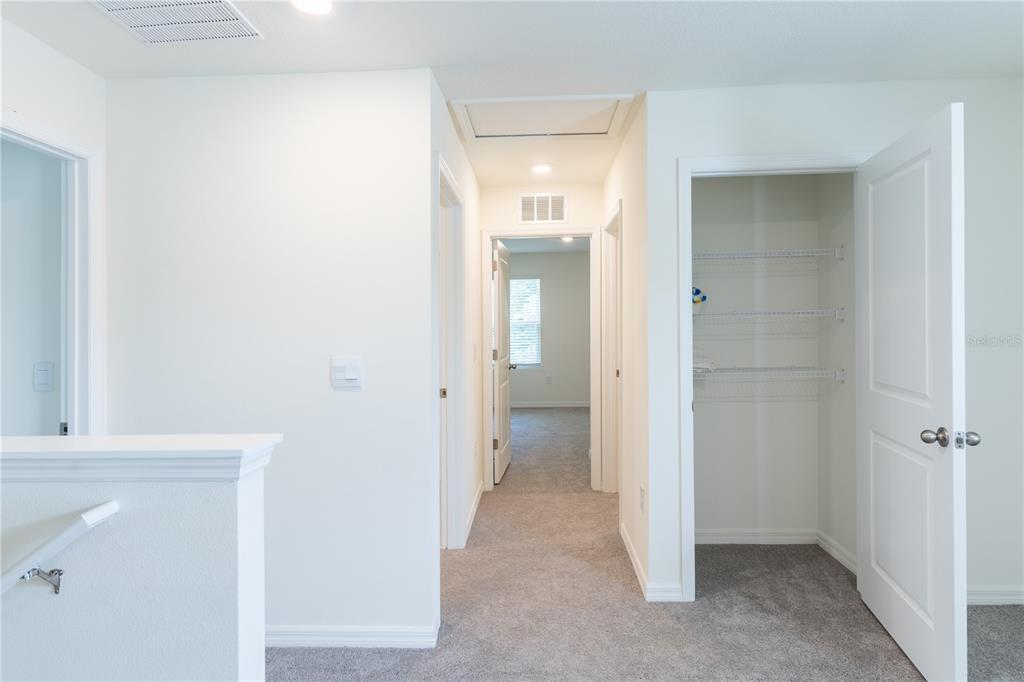 4807 Southwest 51st Terrace Gainesville, FL 32608 - Photo 29 of 35 a view of a bathroom from a hallway with toilet