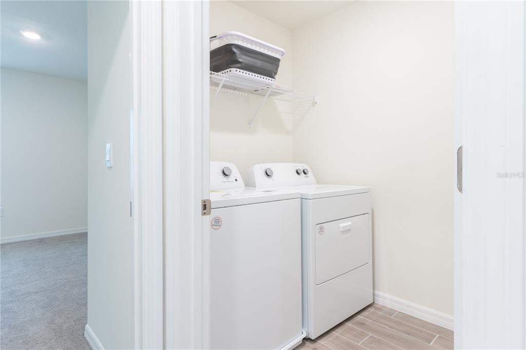 4807 Southwest 51st Terrace Gainesville, FL 32608 - Photo 31 of 35 a utility room with dryer and washer