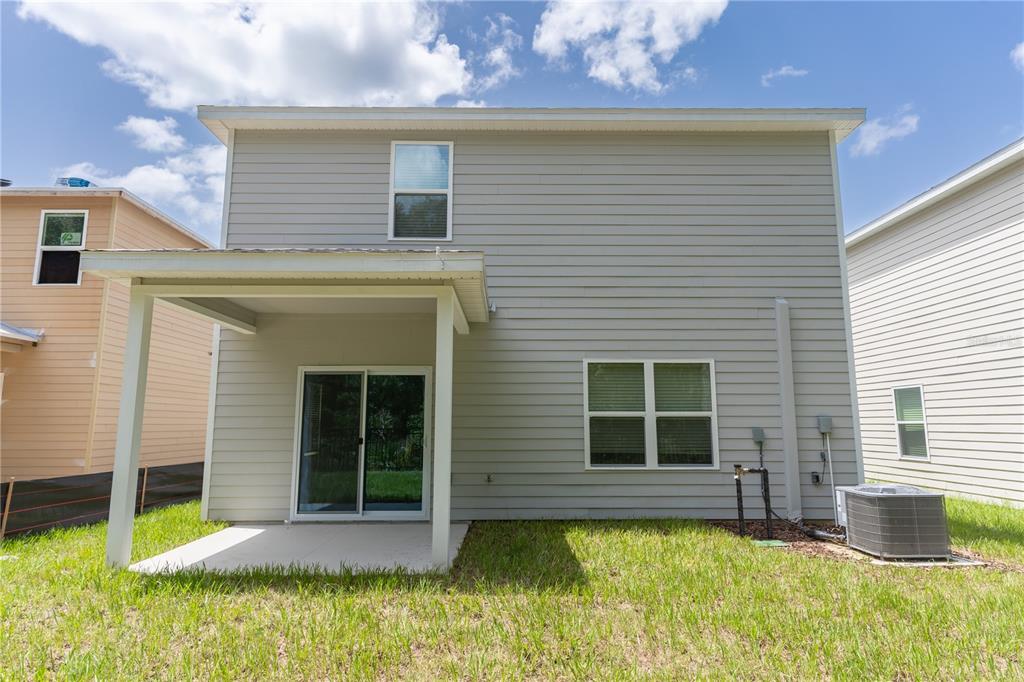 4807 Southwest 51st Terrace Gainesville, FL 32608 - Photo 35 of 35 a front view of a house with a yard